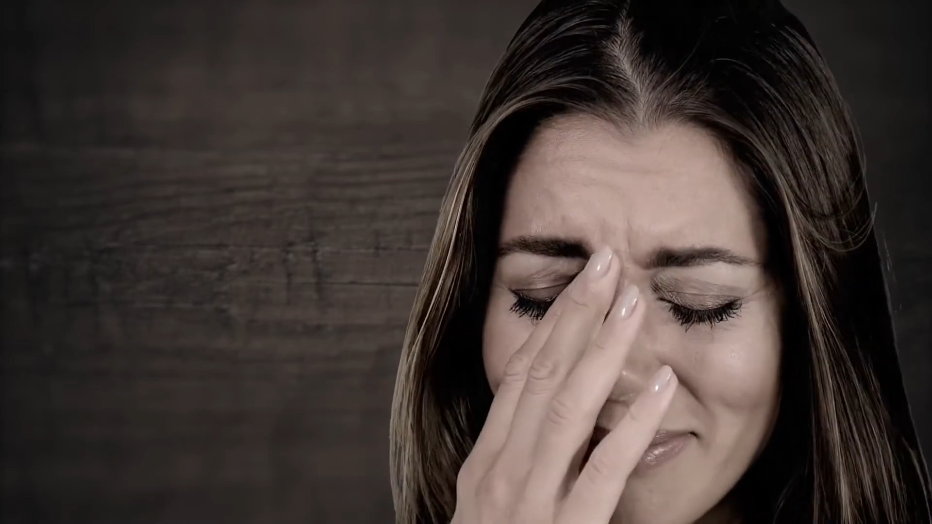 Woman in distress crying and being suicidal